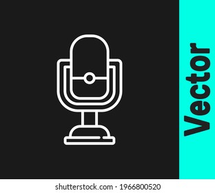 White line Microphone icon isolated on black background. On air radio mic microphone. Speaker sign.  Vector