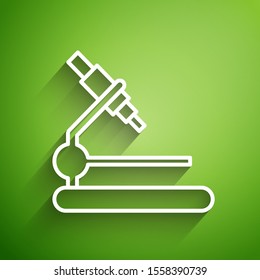 White line Microscope icon isolated on green background. Chemistry, pharmaceutical instrument, microbiology magnifying tool.  Vector Illustration