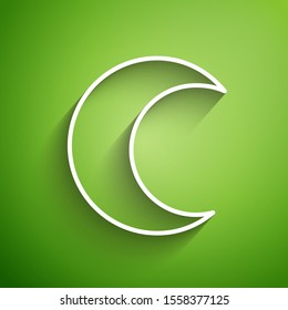 White line Moon and stars icon isolated on green background.  Vector Illustration