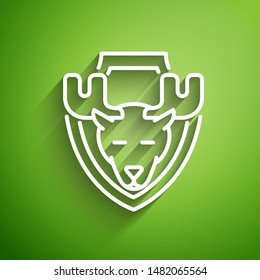 White line Moose head on shield icon isolated on green background. Hunting trophy on wall.  Vector Illustration
