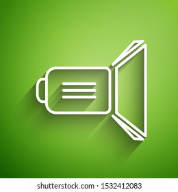 White line Movie spotlight icon isolated on green background. Light Effect. Scene, Studio, Show.  Vector Illustration