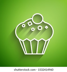 White line Muffin icon isolated on green background.  Vector Illustration