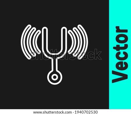 White line Musical tuning fork for tuning musical instruments icon isolated on black background.  Vector