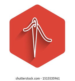White line Needle for sewing with thread icon isolated with long shadow. Tailor symbol. Textile sew up craft sign. Embroidery tool. Red hexagon button. Vector Illustration