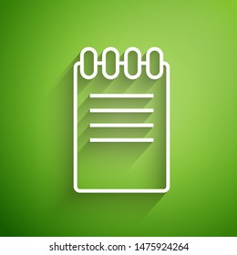 White line Notebook icon isolated on green background. Spiral notepad icon. School notebook. Writing pad. Diary for business. Notebook cover design.  Vector Illustration
