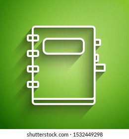 White line Notebook icon isolated on green background. Spiral notepad icon. School notebook. Writing pad. Diary for school.  Vector Illustration