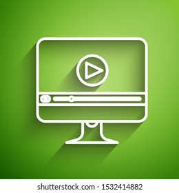 White line Online play video icon isolated on green background. Computer monitor and film strip with play sign.  Vector Illustration