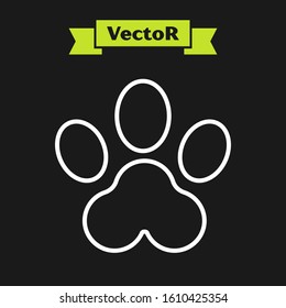 White line Paw print icon isolated on black background. Dog or cat paw print. Animal track.  Vector Illustration