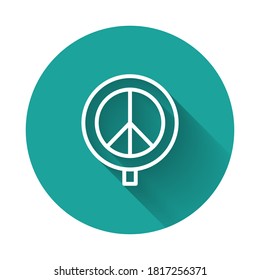 White line Peace icon isolated with long shadow. Hippie symbol of peace. Green circle button. Vector.