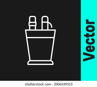 White line Pencil case stationery icon isolated on black background. Pencil, pen, ruler in a glass for office.  Vector