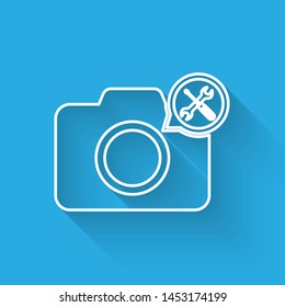 White line Photo camera with screwdriver and wrench icon isolated with long shadow. Adjusting, service, setting, maintenance, repair, fixing.  Vector Illustration