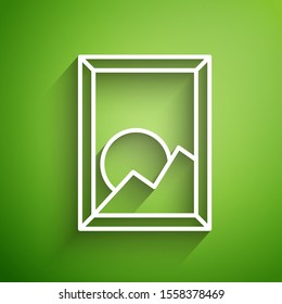 White line Picture landscape icon isolated on green background.  Vector Illustration