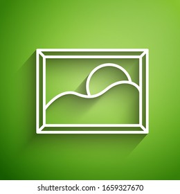 White line Picture landscape icon isolated on green background.  Vector Illustration
