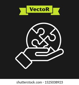 White line Piece of puzzle in hand icon isolated on black background. Business, marketing, finance, template, layout, infographics concept.  Vector Illustration