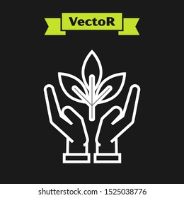 White line Plant in hand of environmental protection icon isolated on black background. Seed and seedling. Planting sapling. Ecology concept.  Vector Illustration