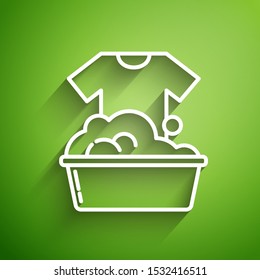 White line Plastic basin with soap suds icon isolated on green background. Bowl with water. Washing clothes, cleaning equipment.  Vector Illustration