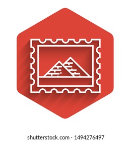 White line Postal stamp and Egypt pyramids icon isolated with long shadow. Red hexagon button. Vector Illustration