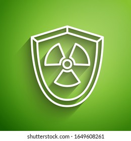 White line Radioactive in shield icon isolated on green background. Radioactive toxic symbol. Radiation Hazard sign.  Vector Illustration