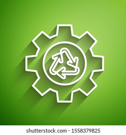 White line Recycle symbol and gear icon isolated on green background. Circular arrow icon. Environment recyclable go green.  Vector Illustration