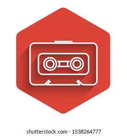White line Retro audio cassette tape icon isolated with long shadow. Red hexagon button. Vector Illustration