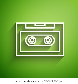 White line Retro audio cassette tape icon isolated on green background.  Vector Illustration