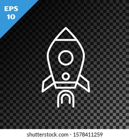 White line Rocket ship with fire icon isolated on transparent dark background. Space travel.  Vector Illustration