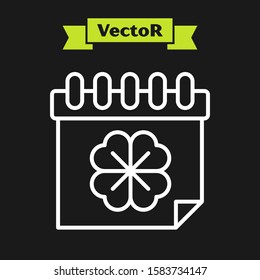 White line Saint Patricks day with calendar icon isolated on black background. Four leaf clover symbol. Date 17 March.  Vector Illustration