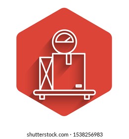 White line Scale with cardboard box icon isolated with long shadow. Logistic and delivery. Weight of delivery package on a scale. Red hexagon button. Vector Illustration