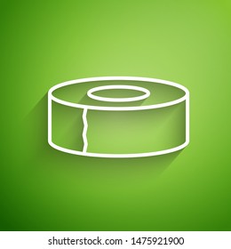 White line Scotch icon isolated on green background. Roll of adhesive tape for work and repair. Sticky packing tape. Office tool and stuff.  Vector Illustration