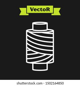 White line Sewing thread on spool icon isolated on black background. Yarn spool. Thread bobbin.  Vector Illustration