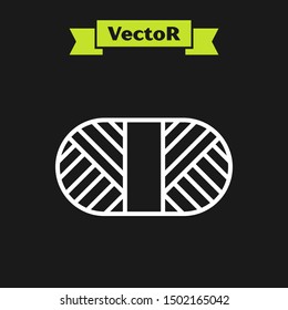 White line Sewing thread on spool icon isolated on black background. Yarn spool. Thread bobbin.  Vector Illustration