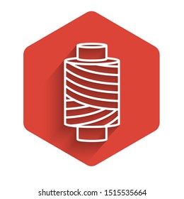 White line Sewing thread on spool icon isolated with long shadow. Yarn spool. Thread bobbin. Red hexagon button. Vector Illustration