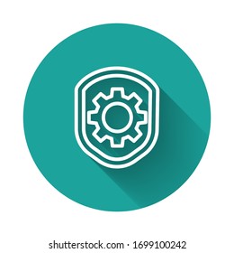 White line Shield with settings gear icon isolated with long shadow. Adjusting, service, maintenance, repair, fixing. Green circle button. Vector Illustration