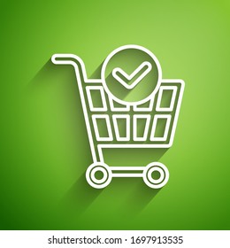 White line Shopping cart with check mark icon isolated on green background. Supermarket basket with approved, confirm, done, tick, completed.  Vector Illustration