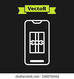 White line Smartphone with gift box on the screen icon isolated on black background. Merry Christmas and Happy New Year.  Vector Illustration