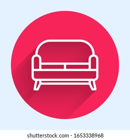 White line Sofa icon isolated with long shadow. Red circle button. Vector Illustration