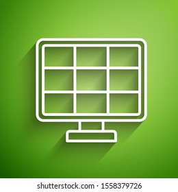 White line Solar energy panel icon isolated on green background.  Vector Illustration
