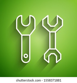 White line Spanner icon isolated on green background.  Vector Illustration