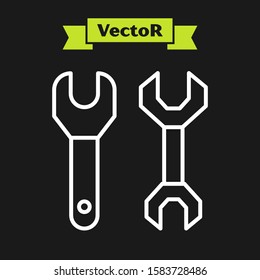 White line Spanner icon isolated on black background.  Vector Illustration