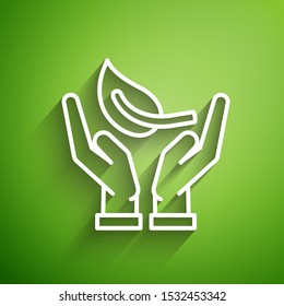 White line Sprout in hand of environmental protection icon isolated on green background. Seed and seedling. Planting sapling. Ecology concept.  Vector Illustration