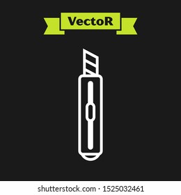 White line Stationery knife icon isolated on black background. Vector Illustration