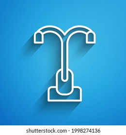 White line Street light system icon isolated on blue background. Long shadow. Vector