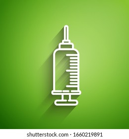 White line Syringe with pet vaccine icon isolated on green background. Dog or cat paw print.  Vector Illustration