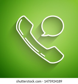 White line Telephone handset and speech bubble chat icon isolated on green background. Phone sign.  Vector Illustration