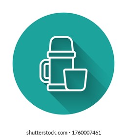 White line Thermos container and cup icon isolated with long shadow. Thermo flask icon. Camping and hiking equipment. Green circle button. Vector Illustration