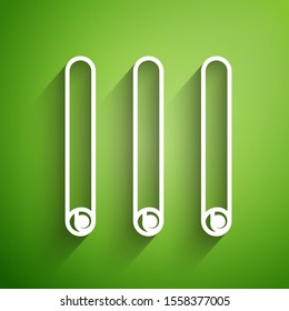 White line Three rolled sticks of cinnamon icon isolated on green background. Aromatic spice. Condiment for dishes. Cooking theme.  Vector Illustration