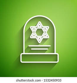 White line Tombstone with star of david icon isolated on green background. Jewish grave stone. Gravestone icon.  Vector Illustration