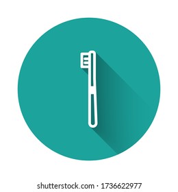 White line Toothbrush icon isolated with long shadow. Green circle button. Vector Illustration