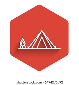 White line Tourist tent with wood fire icon isolated with long shadow. Camping symbol. Red hexagon button. Vector Illustration