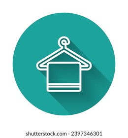White line Towel on a hanger icon isolated with long shadow. Bathroom towel icon. Green circle button. Vector Illustration